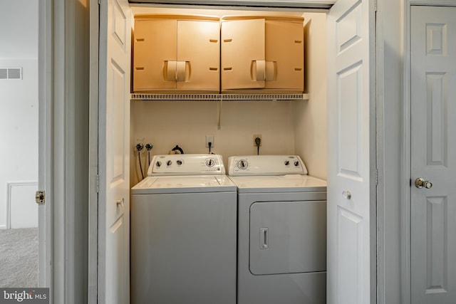 laundry area featuring washer and dryer