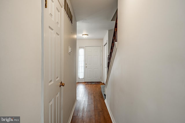 hallway featuring hardwood / wood-style floors