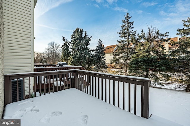 view of snow covered deck