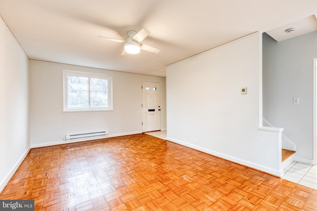 unfurnished room with light parquet floors, a baseboard radiator, and ceiling fan