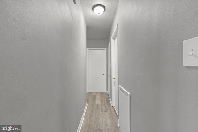 corridor featuring light hardwood / wood-style flooring