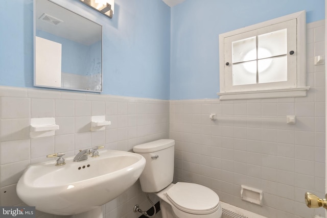 bathroom with toilet and sink