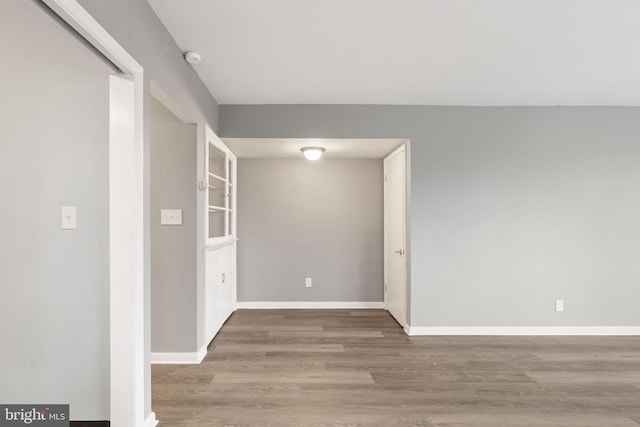 spare room featuring hardwood / wood-style floors