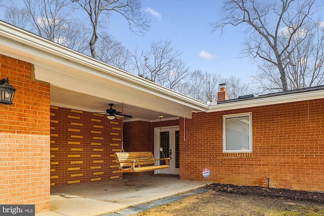 view of patio / terrace featuring ceiling fan