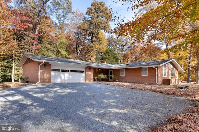 ranch-style home with a garage