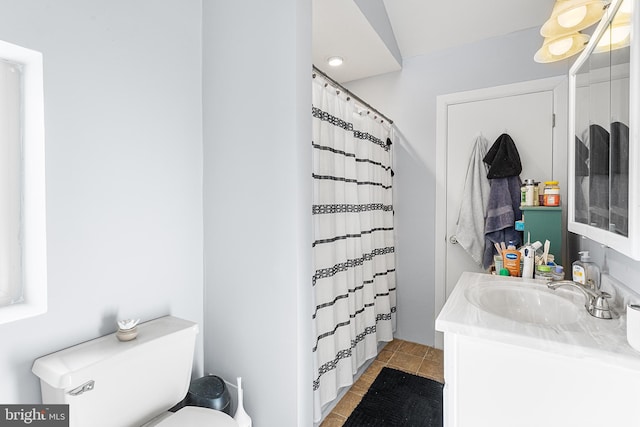 bathroom with vanity, toilet, and a shower with shower curtain