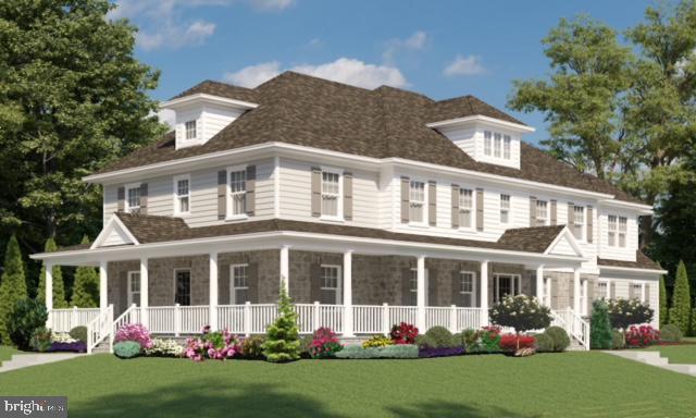 view of front of house with a front yard and a porch