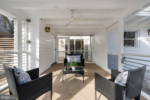 sunroom / solarium with beam ceiling