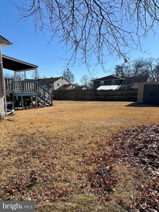 view of yard with a deck