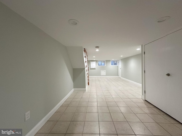 empty room with light tile patterned flooring