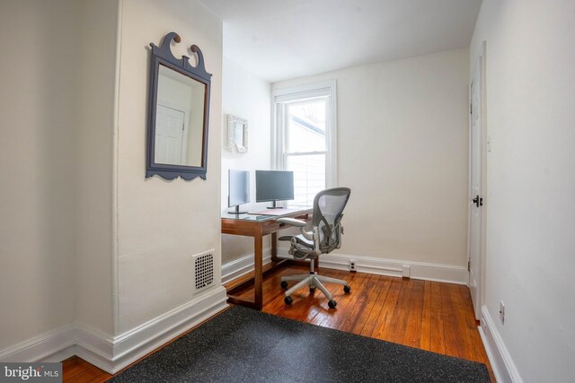 office area with hardwood / wood-style floors