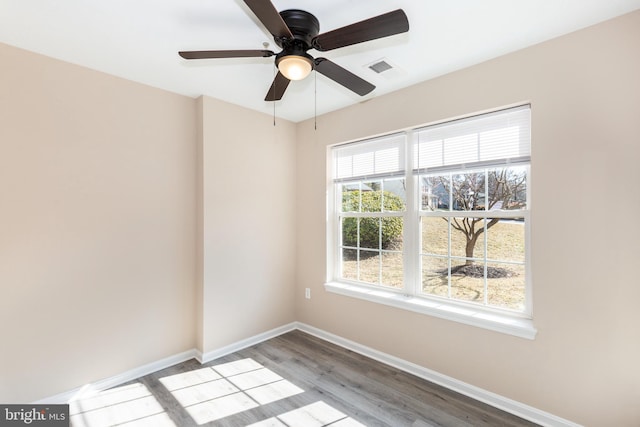 spare room featuring light hardwood / wood-style flooring