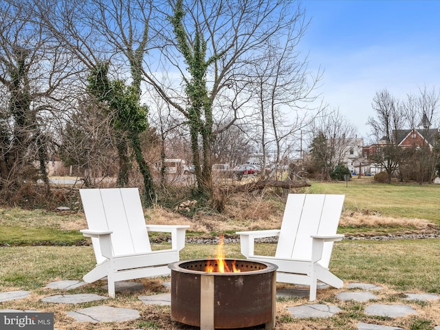 view of patio / terrace with a fire pit