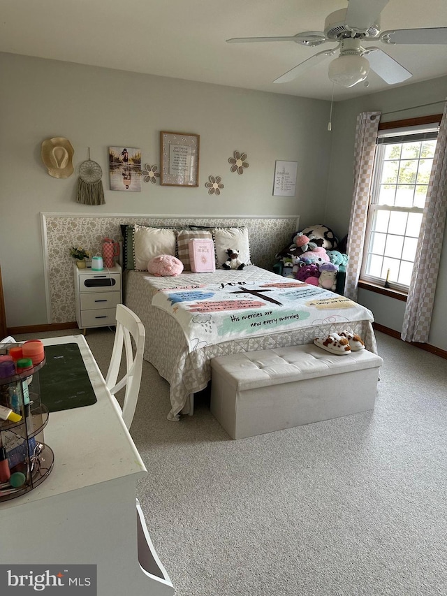 carpeted bedroom with ceiling fan