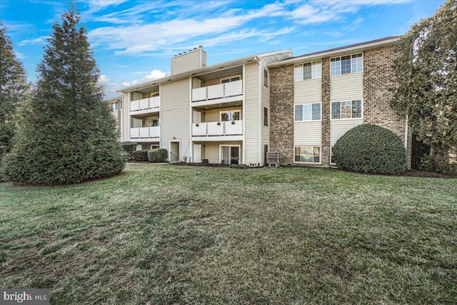 view of property featuring central AC unit