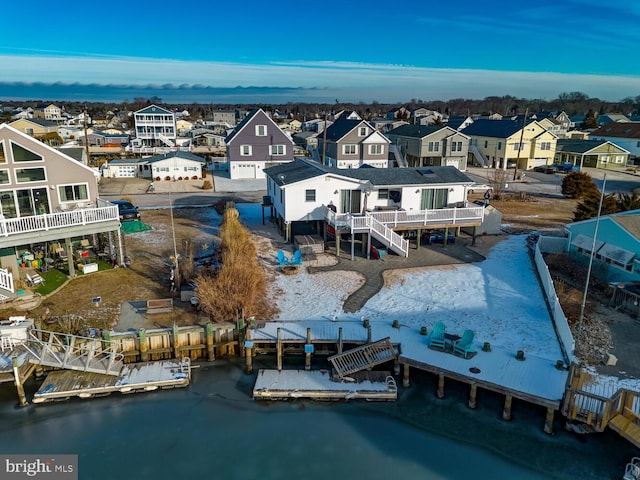 drone / aerial view with a water view