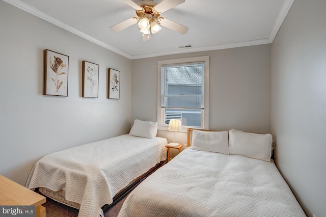 bedroom with crown molding and ceiling fan