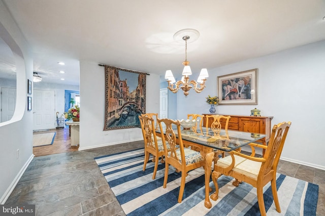 dining room featuring a notable chandelier