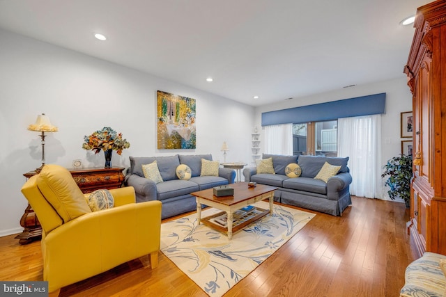 living room featuring light wood-type flooring