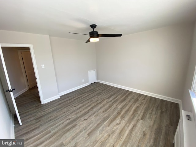 spare room featuring hardwood / wood-style flooring and ceiling fan