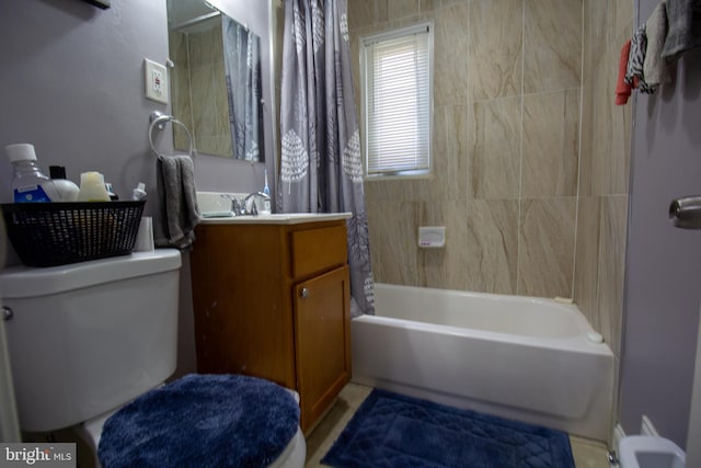 full bathroom with vanity, toilet, and shower / tub combo