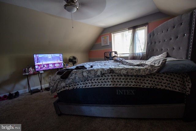 carpeted bedroom with vaulted ceiling