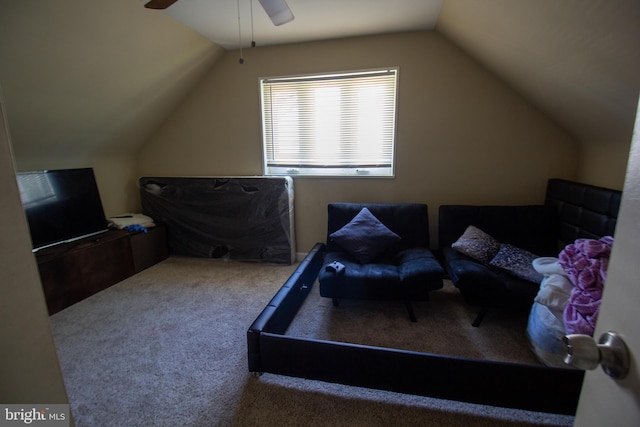 bedroom featuring ceiling fan, lofted ceiling, and carpet