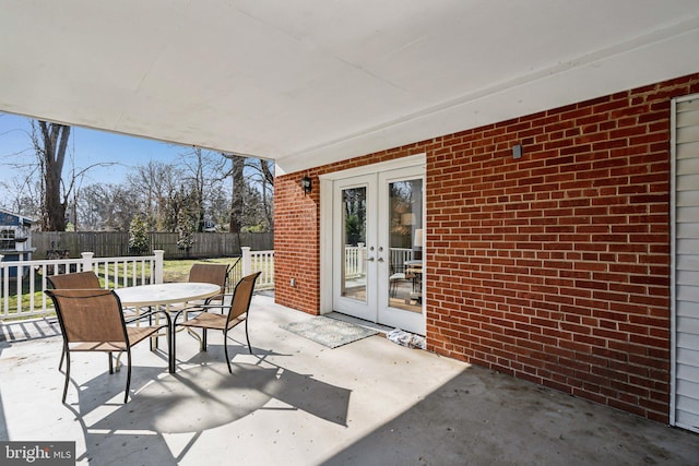 view of patio featuring french doors