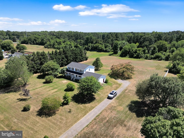 birds eye view of property featuring a rural view