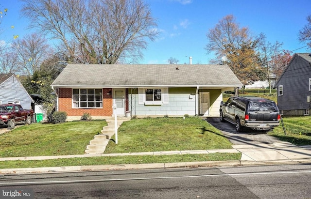 view of front of property featuring a carport and a front lawn