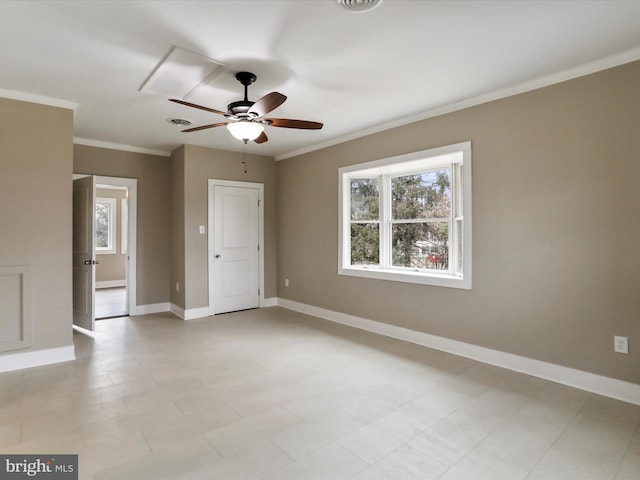 unfurnished room featuring crown molding and ceiling fan