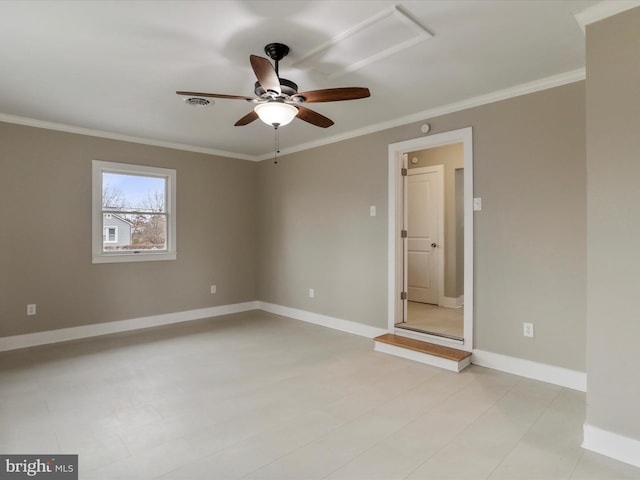 empty room with ornamental molding and ceiling fan