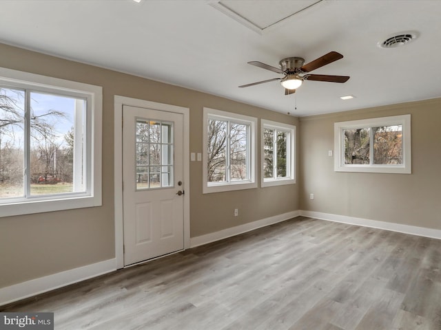 interior space featuring ceiling fan and light hardwood / wood-style floors