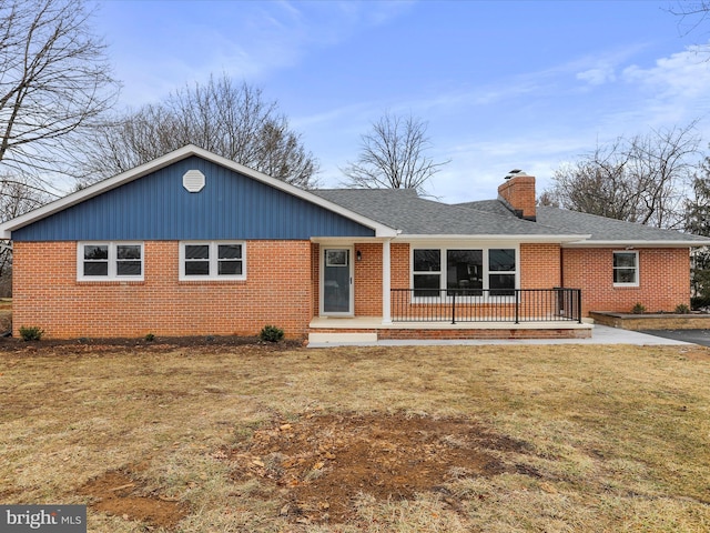 ranch-style home with a front yard