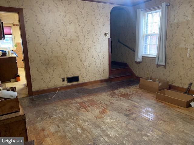 spare room with hardwood / wood-style flooring