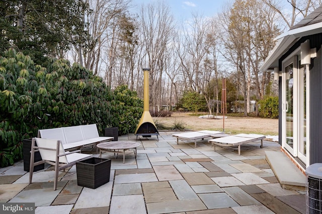 view of patio featuring central AC and an outdoor hangout area