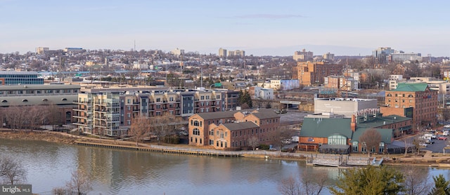 property's view of city featuring a water view