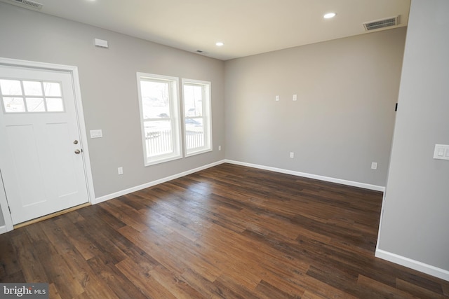 entrance foyer featuring dark hardwood / wood-style flooring