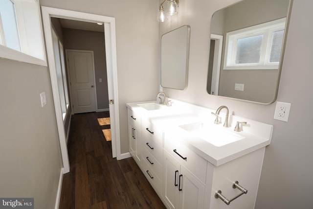 bathroom with vanity and hardwood / wood-style floors