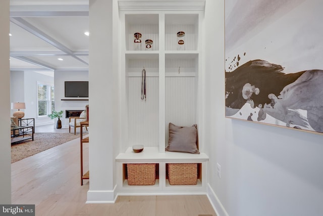 mudroom with hardwood / wood-style flooring, coffered ceiling, and beam ceiling