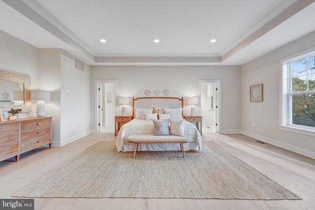 bedroom featuring a tray ceiling