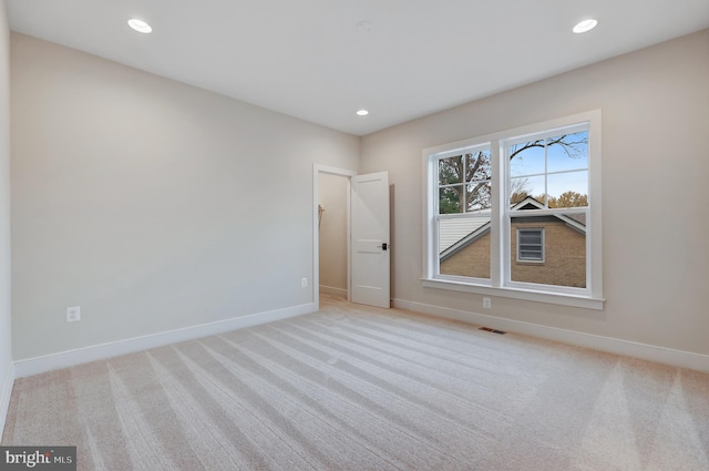 view of carpeted spare room