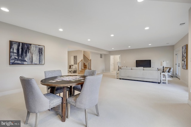 view of carpeted dining space