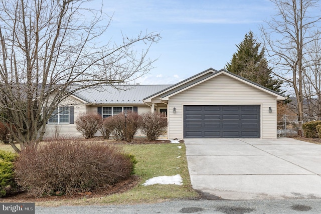 ranch-style house featuring a garage