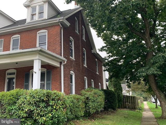 view of home's exterior featuring covered porch