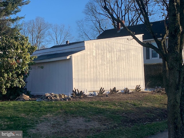 view of property exterior featuring a yard