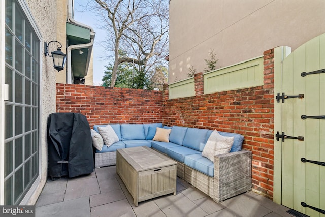 view of patio / terrace featuring a grill, an outdoor hangout area, and french doors