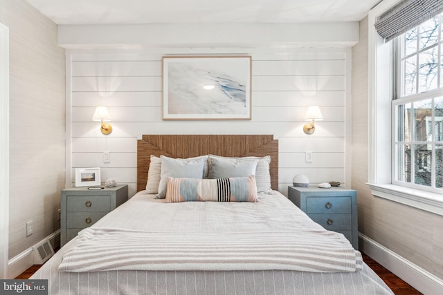 bedroom featuring dark wood-type flooring