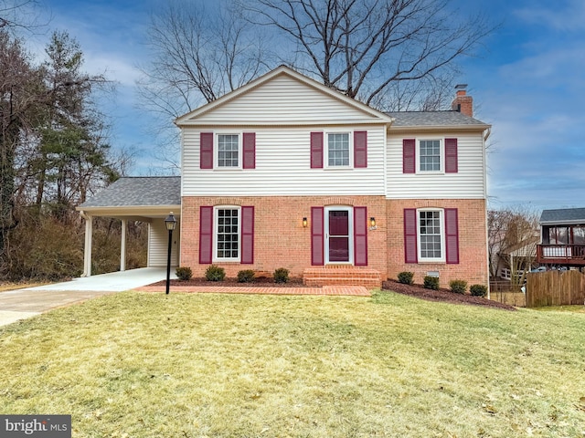 view of front of house featuring a front yard and a carport