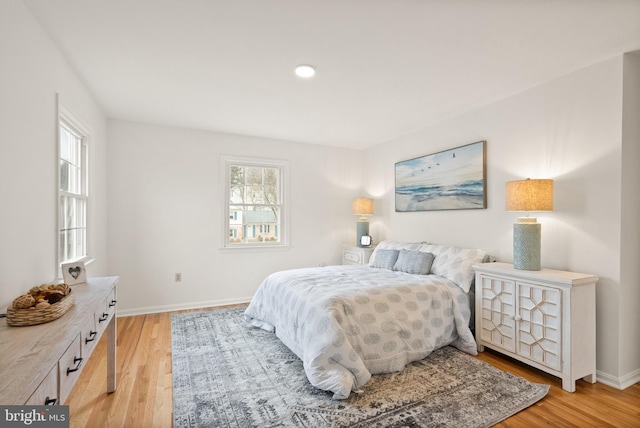 bedroom with light hardwood / wood-style floors